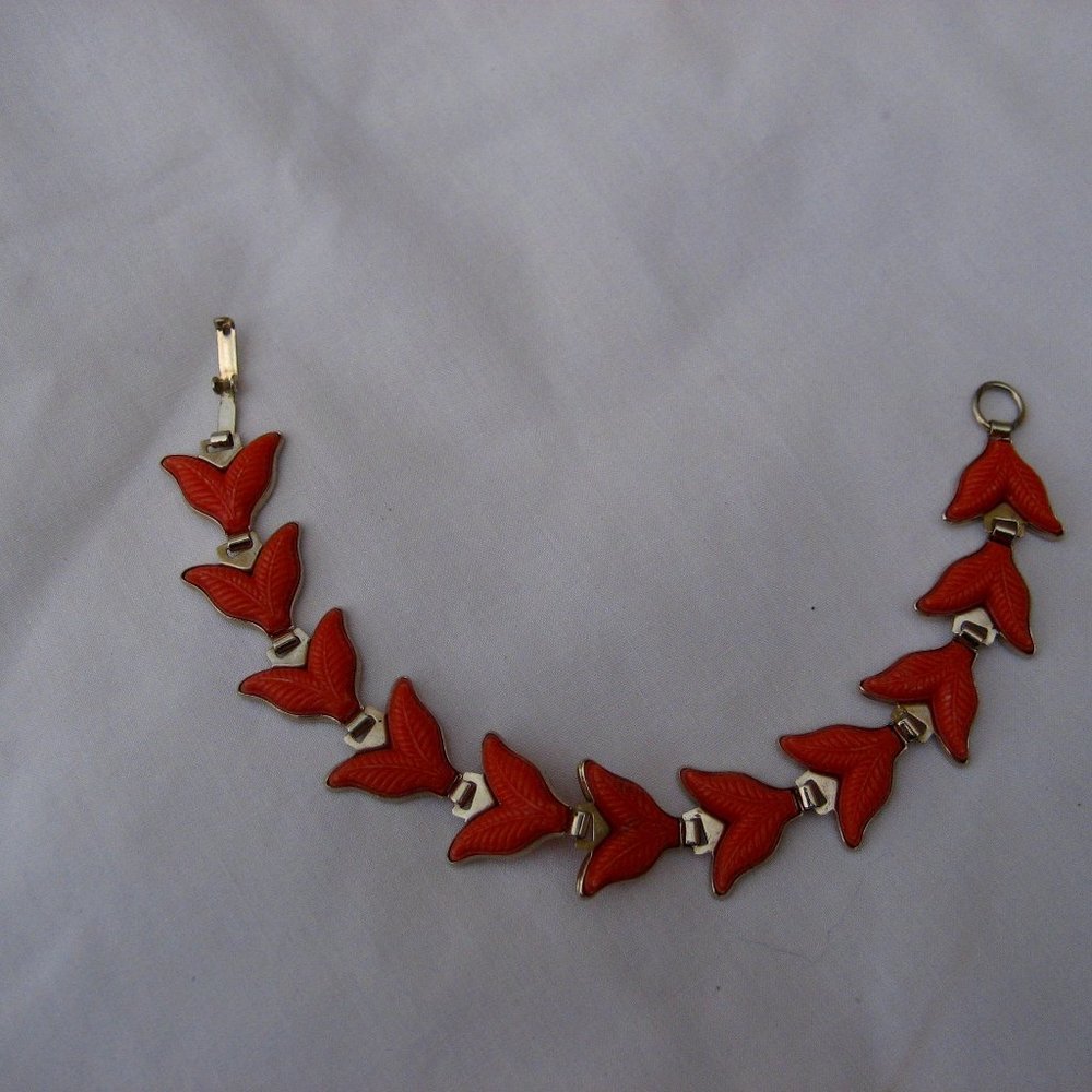 TEXTURED ORANGE PLASTIC LEAF BRACELET CHILDS???
